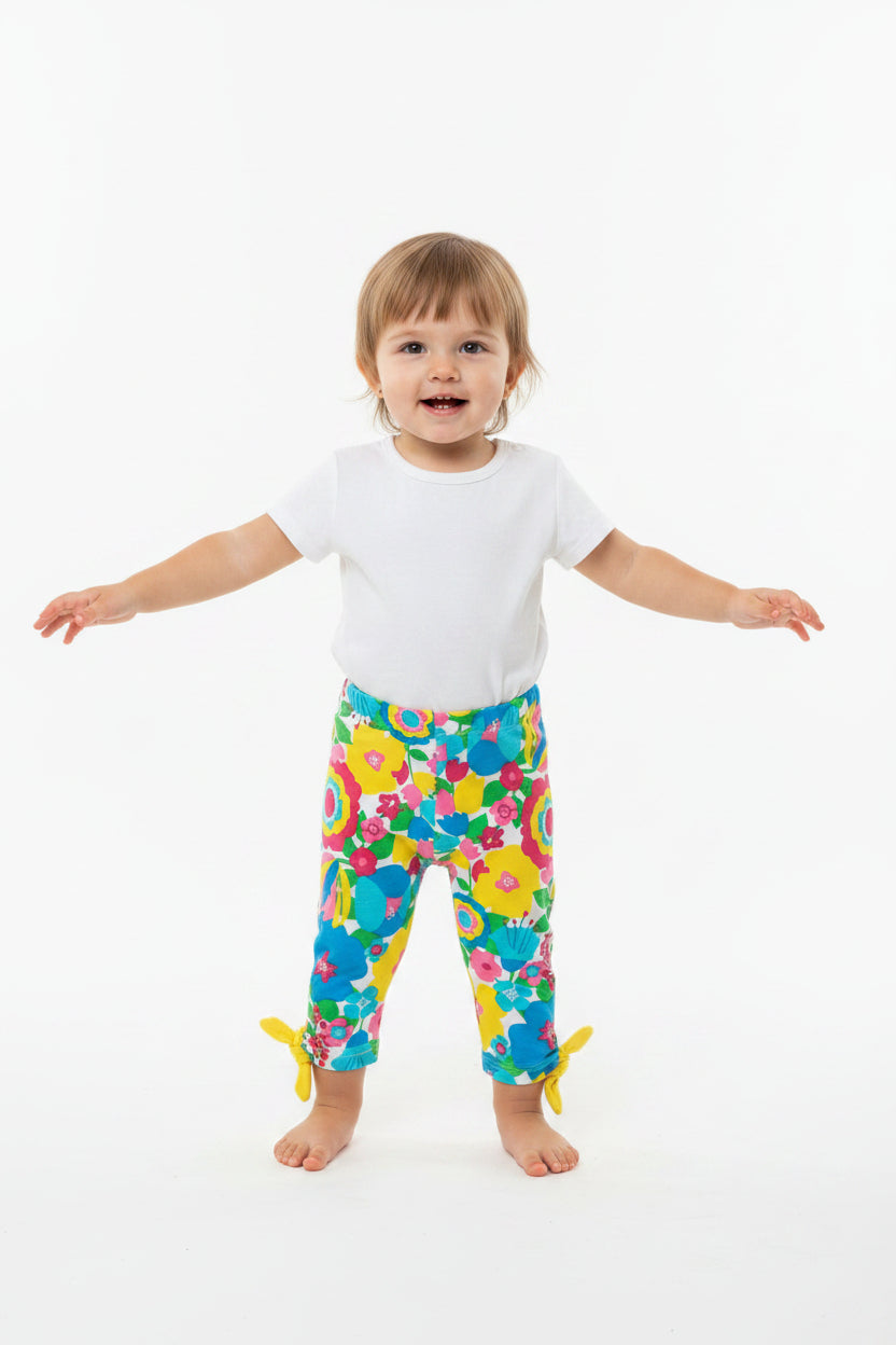 Legging motif fleurs avec boucles jaune