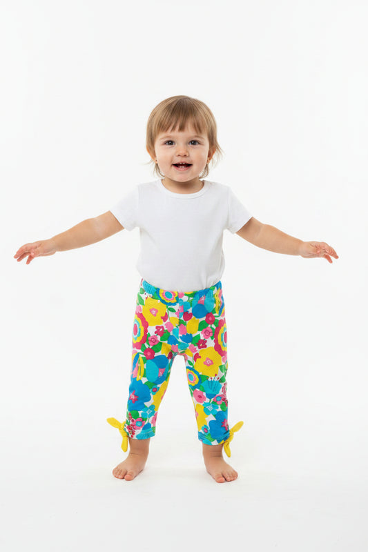 Legging motif fleurs avec boucles jaune