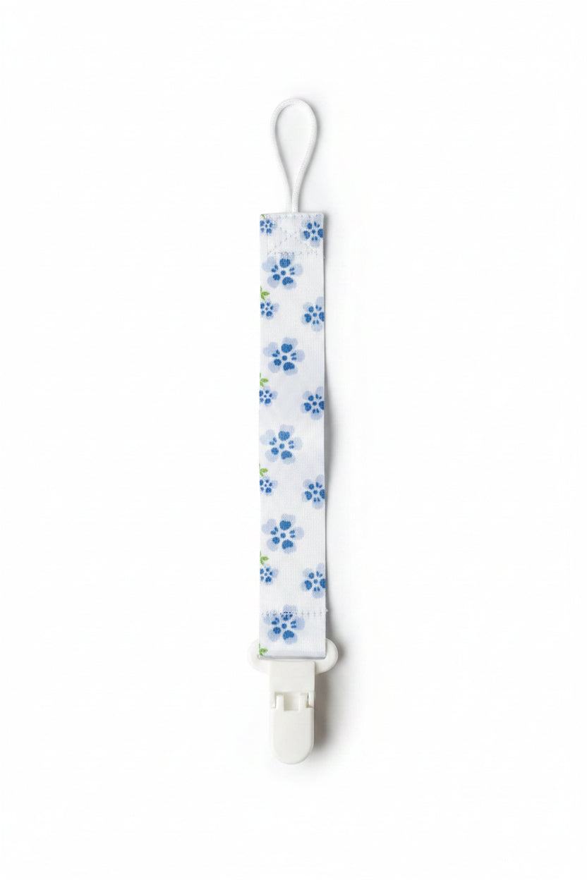 Attache à suce Blanche, Fleurs Bleue