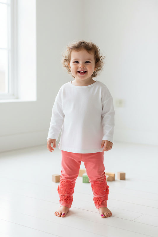 Legging orangé fleurs volantes avec petit faux diamant