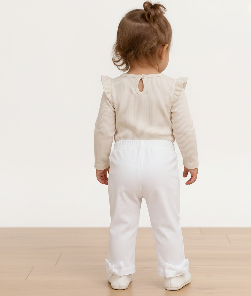 Legging blanc avec noeuds papillons en soie blanc