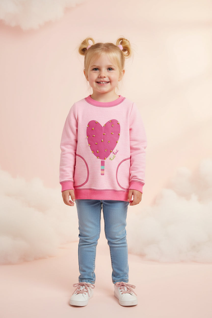 Chandail rose cœur‑sucré